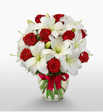  çankaya çiçekçilik hediye çiçek yolla  1 dal kazablanka 11 adet kırmızı gül vazosu